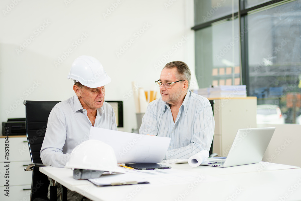 Fototapeta premium Engineers are discussing data working and laptop or tablet with architectural project at new construction site
