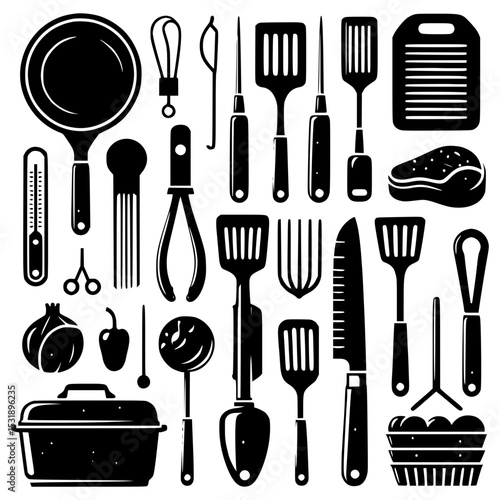 Collection of black and white grilling and cooking utensils
