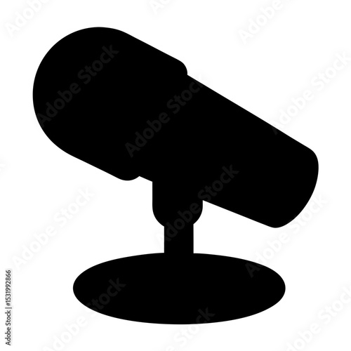 A black microphone on a stand, used for music or speech