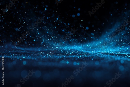 Elegant glowing particles on deep blue background