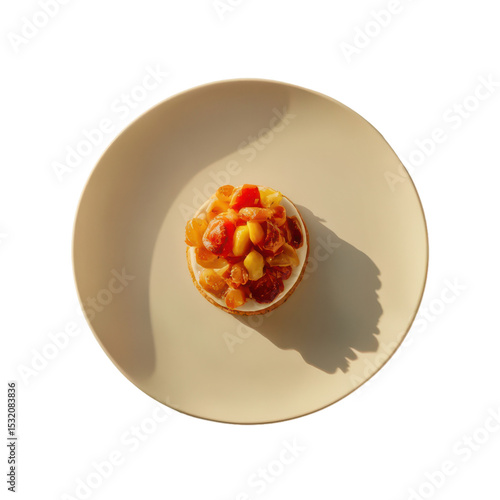 Mixed fruit tart with golden raisins and creamy filling