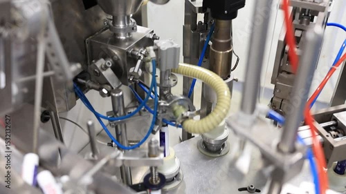 production line of the ointment tube in the Pharma factory