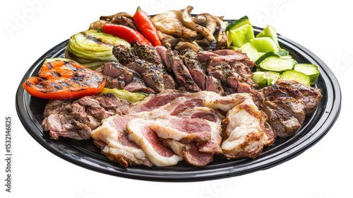 Assorted Grilled Meat and Fresh Vegetables Platter Served on a Black Plate with Transparent Background