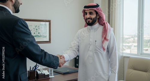 Successful Business Handshake: Arab Businessmen Closing a Deal