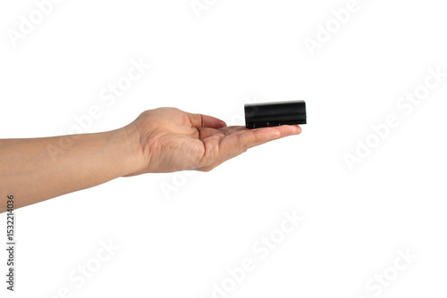 Wallpaper Mural Black DSLR camera battery and hand on transparent background Torontodigital.ca