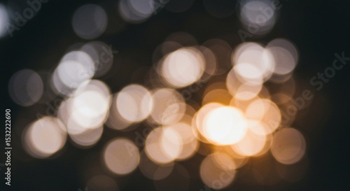 Abstract Golden Bokeh Lights on Dark Background