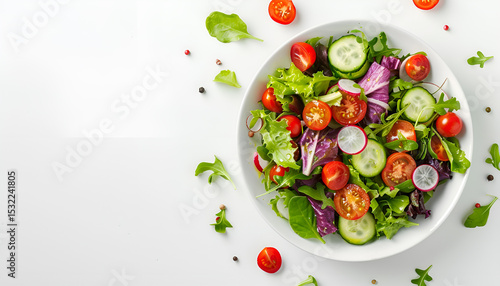 Bowl with delicious vegetable salad on white background, top view