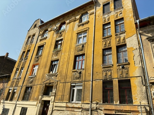 Photography Windowed facade of an old building in Budapest.