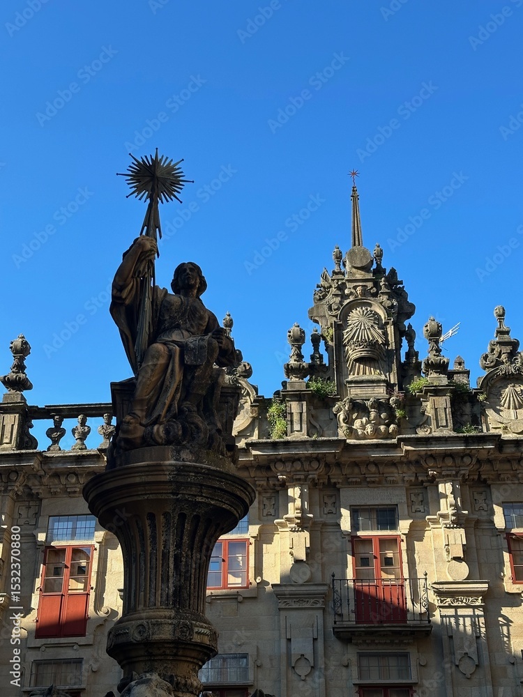 Fototapeta premium A large statue on top of a building