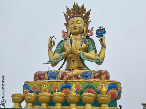 A 35 ft tall golden statue of Buddhist saint Avalokiteshvara (Chenrezig) at Chittray near Tumling in Darjeeling. He is the deity among the tenth-level Bodhisattvas associated with great compassion.