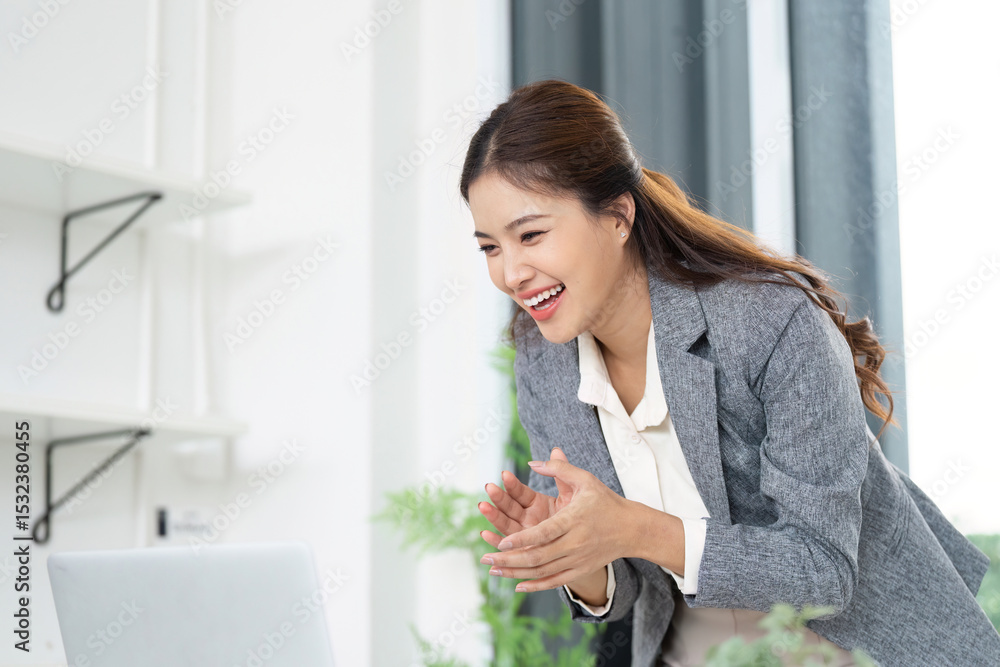 Excitement and Achievement. Happy woman celebrating success in front of laptop. Excitement and Achievement. Happy woman celebrating success in front of laptop.