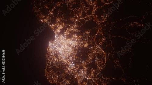 Tangier (Morocco) top view at night. Aerial view on modern city from space. Camera is flying above the city, moving forward. Vertical video. The north is on the left side