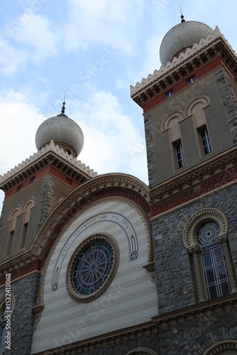 Synagogue of Turin (Tempio Israelitico) – Moorish‑Revival Facade with Onion‑Dome Towers in Urban Setting