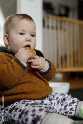 Adorable baby enjoys a tast...