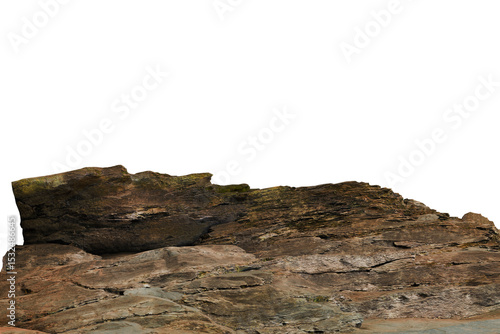 A detailed close-up reveals a rugged, predominantly brown and gray, with subtle hints of green lichen or moss in crevices. The irregular silhouette against a black background emphasizes its uneven