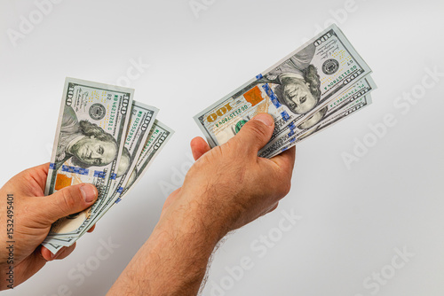 Person counting and handing over money indoors