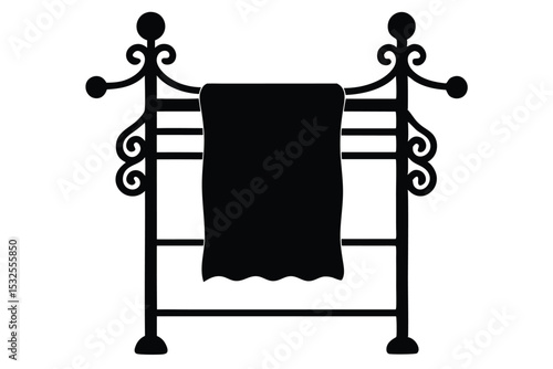 Black Silhouette of Wrought Iron Towel Rack with Towel Hanging Over It