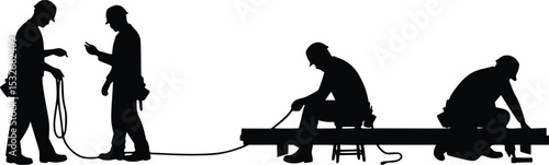 Silhouette of three men using tools and power drill during construction project, symbolizing teamwork and manual labor