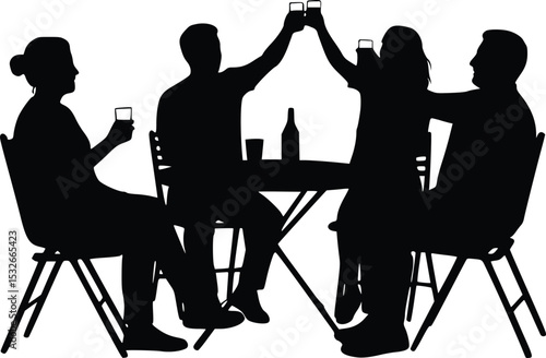Silhouette of four friends sitting around a table raising glasses in a toast during social gathering