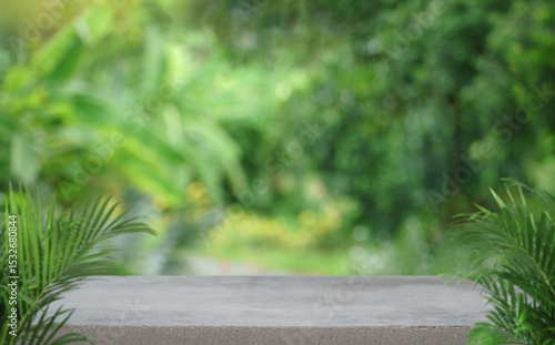 minimal concrete table top podium with outdoors in tropical forest nature background.natural product pedestal modern stand display,jungle paradise concept.