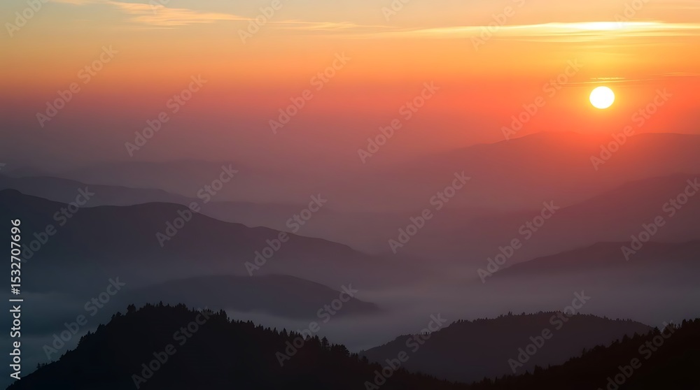 An orange sun shines on shaded mountains. An orange sun shines on shaded mountains.