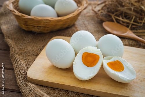 Salted duck eggs on wooden board