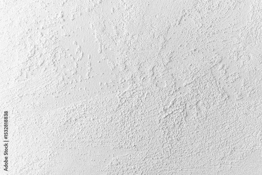Obraz premium Textured white wall with subtle variations in surface detail and pattern