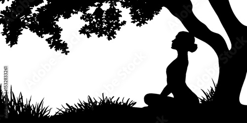 Outdoor yoga class under tree shade with mats on grass