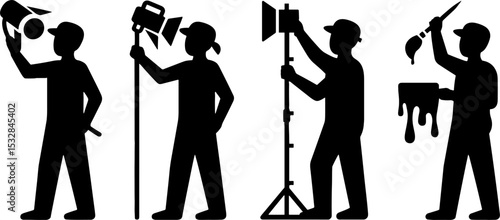Silhouettes Film Crew Setting Lighting Equipment and Painting Scene