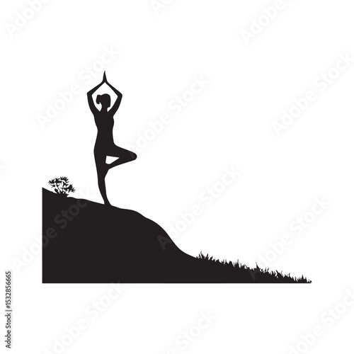 Woman silhouette practicing yoga on hilltop