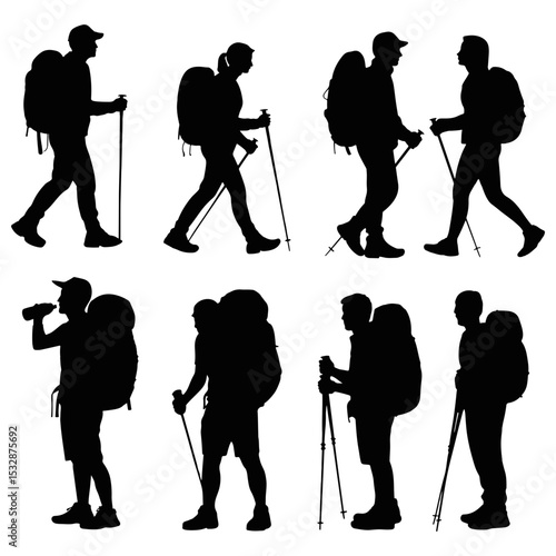 Silhouettes of hikers with backpacks and walking sticks