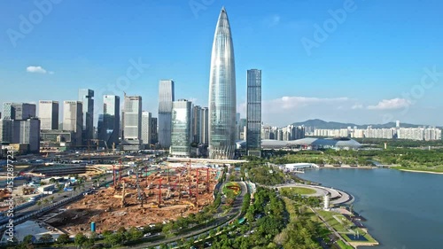 Scenic view of shenzhen talent park and futian central business district under a clear blue sky