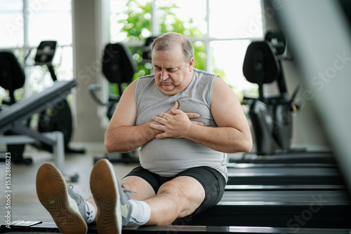 elderly man is experiencing chest pain during exercise.