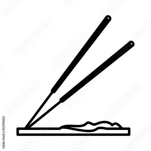 Two chopsticks picking up food on a plate for funerals and funeral services  