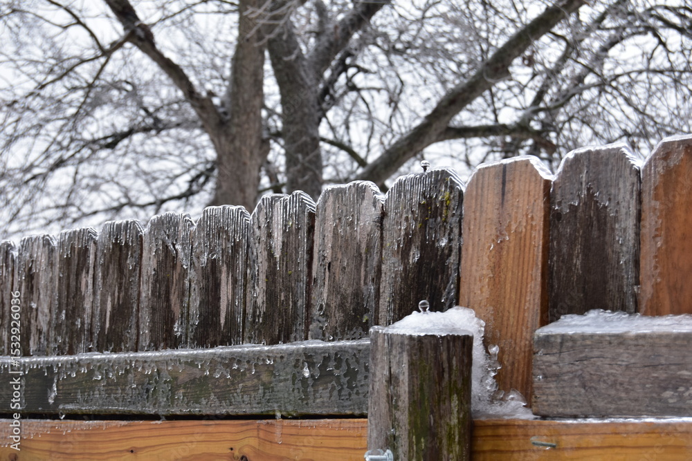 Fototapeta premium Wooden fence in winter