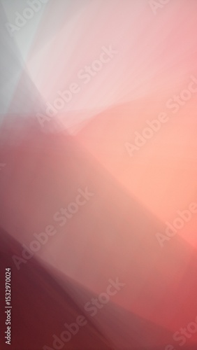 A seamless blend of crimson and blush tones creates a soft yet vibrant gradient, radiating warmth and depth in an elegant abstract flow