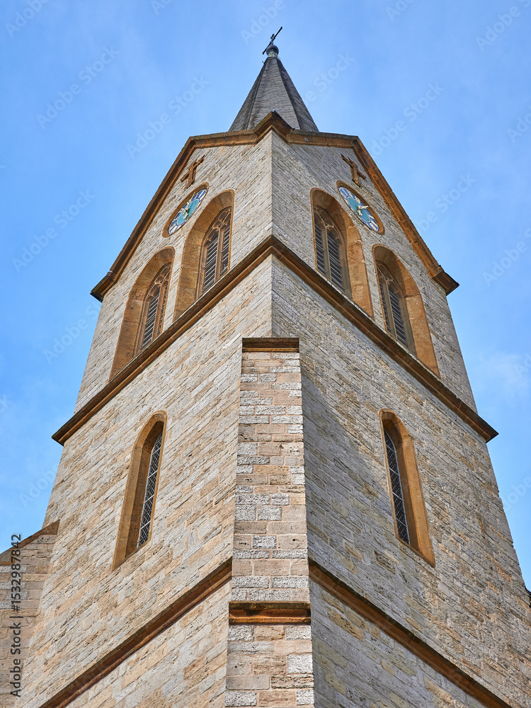 Fototapeta premium Vertical shot of the Stiftskirche Schildesch in Bielefeld Germany during daylight