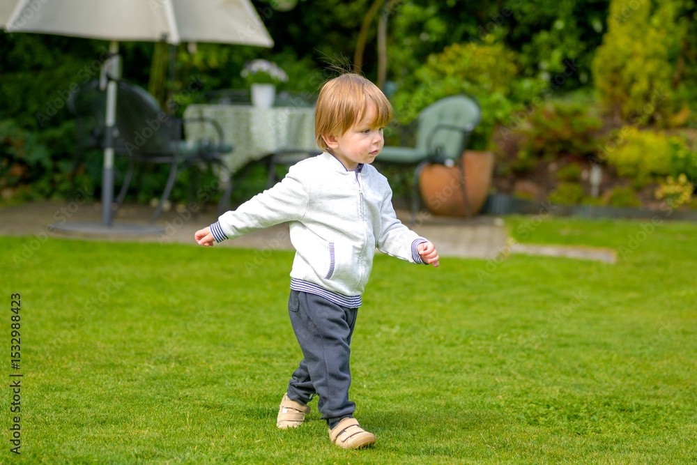Toddler Walking On Lawn Toddler Walking On Lawn