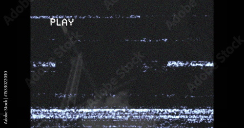 Displaying VCR player screen at home showing horizontal static lines, with pixelated PLAY text