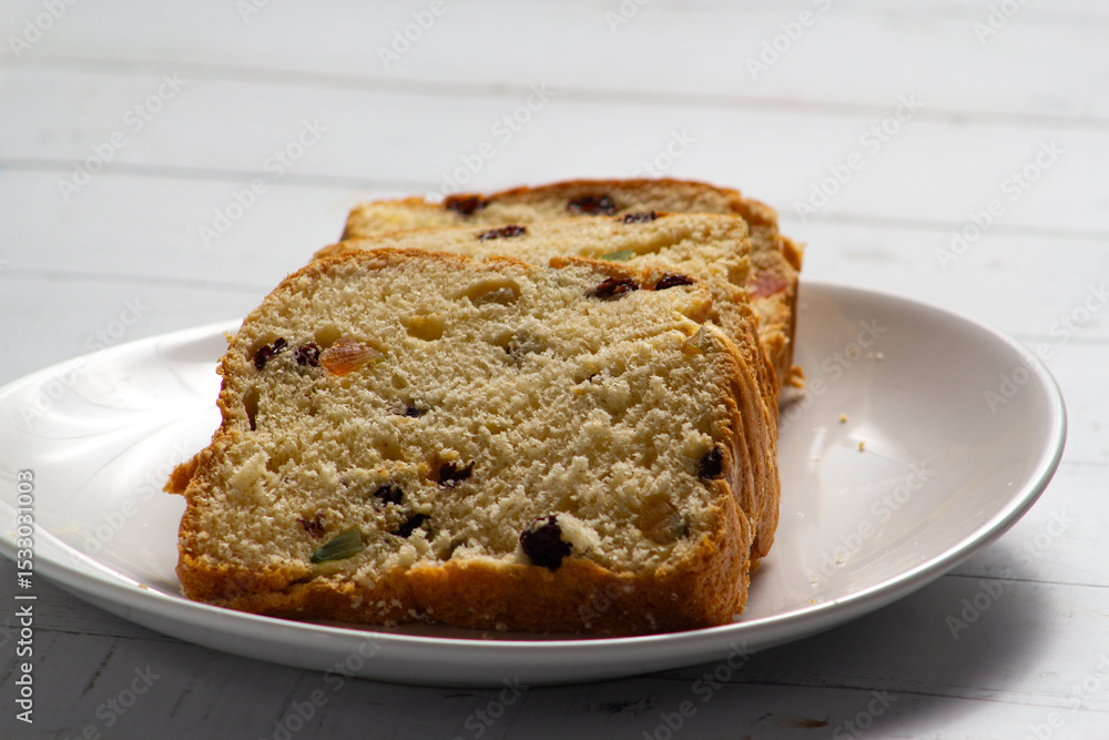 Traditional Sweet Fruit Bread on Wooden Board Traditional Sweet Fruit Bread on Wooden Board