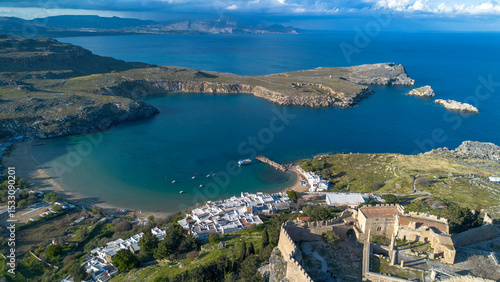 Rhodes, Greece. Lindos small whitewashed village and the Acropolis, scenery of Rhodos Island at Aegean Sea.