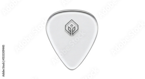 A clear guitar pick with a gray logo in the center isolated on a black background in a studio shot