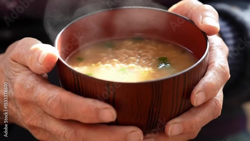 Warm Miso Soup Held by Elderly Hands