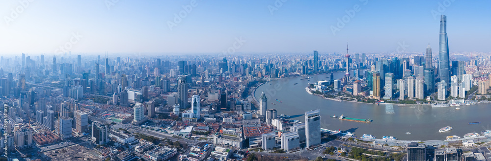 Fototapeta premium Aerial view of Shanghai modern buildings and traditional residential buildings on sunny day.