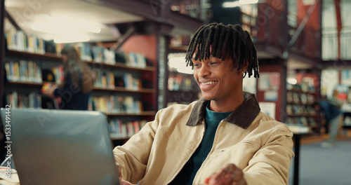 Obraz na plátně University, happy and man on laptop in library for online assignment, studying and test results