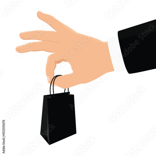 Businessman hand holding black paper shopping bag