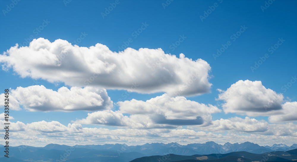 Fototapeta premium Natural Blue Sky with Soft Clouds – Peaceful and Realistic Sky Backgrounds for Weather, Nature, and Outdoor Concepts in Daylight