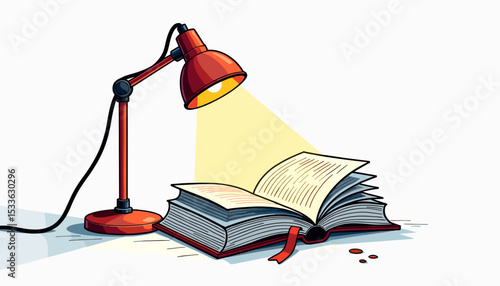 Open book illuminated by a desk lamp