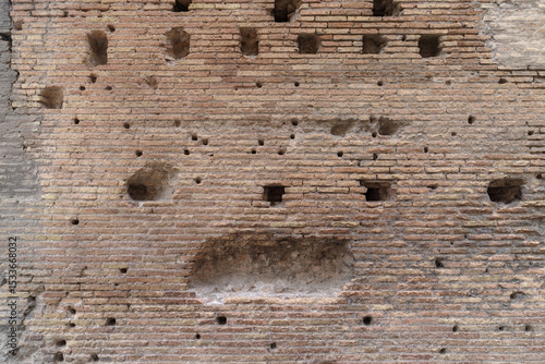 Detail brick wall of Colosseum, Rome, Italy