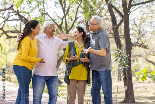 Group of indian senior male and woman friends At park